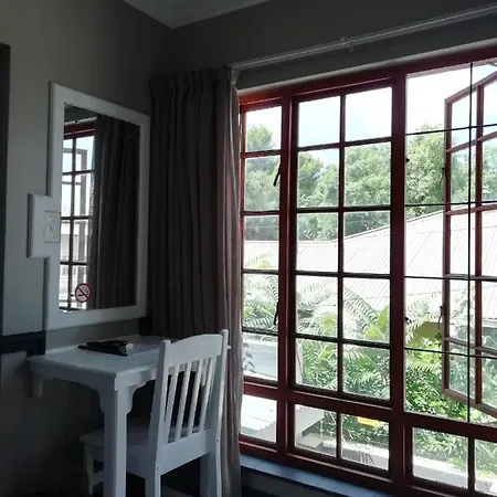 Oakwood Lodge Bloemfontein Exterior photo A window with burglar bars